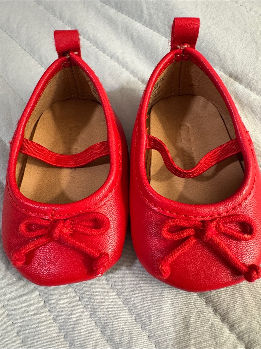 Red Leatherette Baby Dress Shoes with Bow Embellishments